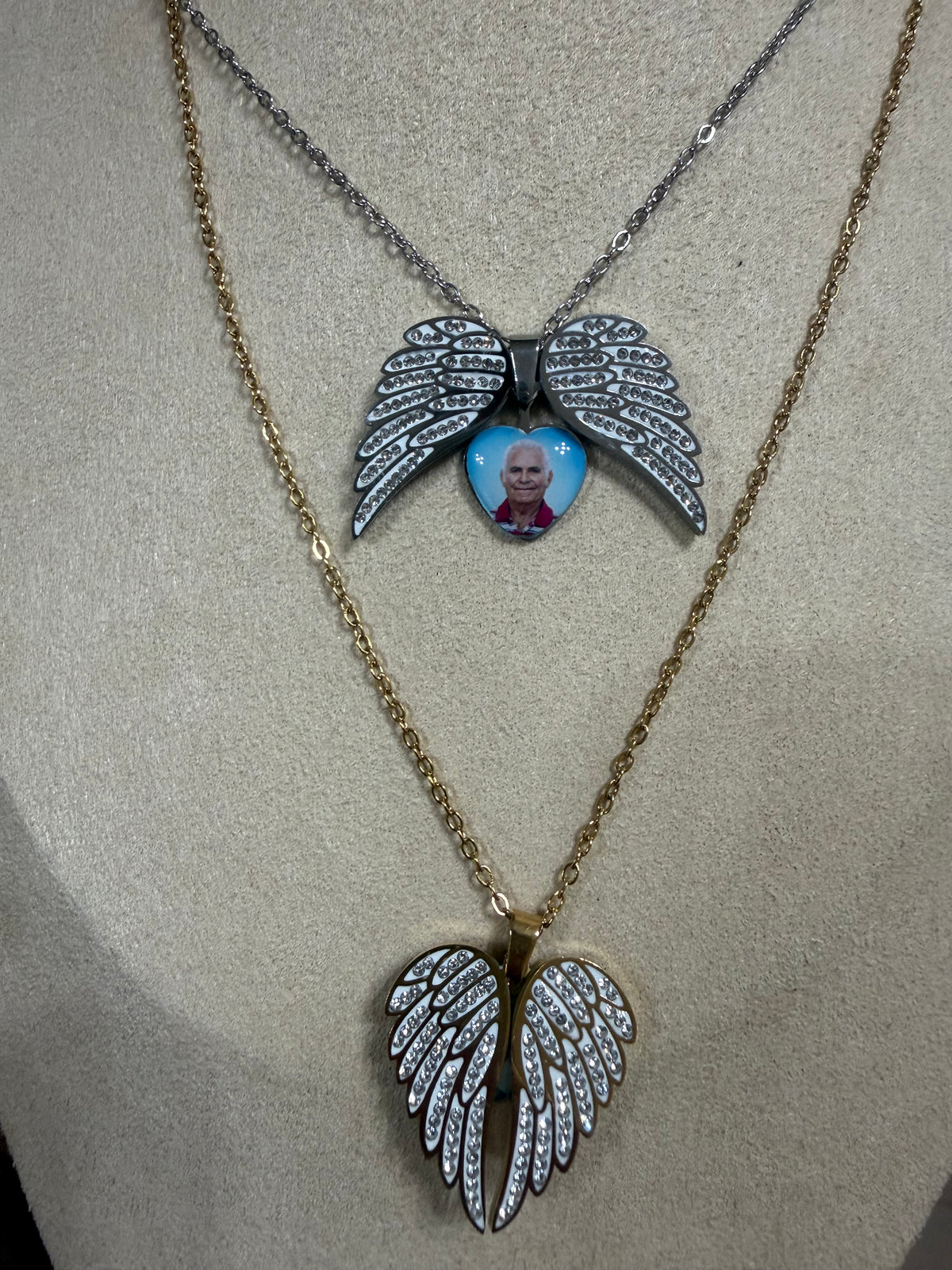 Collana ali apri chiudi
